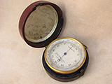 Antique pocket barometer signed G W Strawson, London in leather case